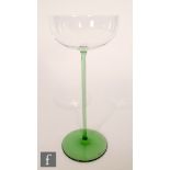 Otto Prutscher - Meyr's Neffe - An early 20th Century wine glass with a green circular spread foot