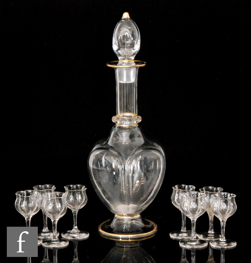 Lobmeyr - A late 19th Century clear glass decanter of footed quatrelobed form with tall collar