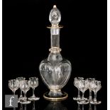 Lobmeyr - A late 19th Century clear glass decanter of footed quatrelobed form with tall collar