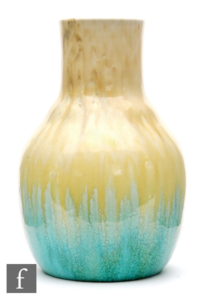 Ruskin Pottery - A crystalline glaze vase of globe and shaft form decorated in a streaked yellow