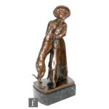 Stefan Schwartz (1851-1924) - An elegant lady with her dog, bronze on black marble base, signed,