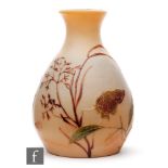 Legras - An early 20th Century cameo glass vase of ovoid form with flared collar neck, cased in