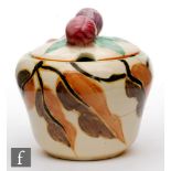 Clarice Cliff - Alton - A shape 230 preserve pot and cover circa 1933, hand painted with a
