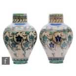 William Rowe - Doulton Lambeth - A pair of late 19th to early 20th Century Persian Ware vases each