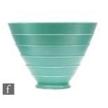 Keith Murray - Wedgwood - A conical bowl of footed form with stepped horizontal bands, the whole