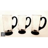 Elis Bergh - Kosta - A set of three post war tankards of cylindrical form with internal vertical