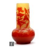 Emille Galle - A late 19th Century cameo glass vase with spherical base and tall cylindrical