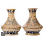Hannah Barlow - Doulton Lambeth - A large pair of stoneware vases of footed low shouldered form with