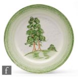 Clarice Cliff - Crayon Scene - Twin Trees - A circular plate circa 1934, hand decorated with a