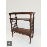 William Birch - An oak book stand or book shelf of three-tier rectangular form, raised to turned