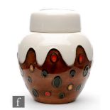 Julie Ann Bowen - Moorcroft Pottery - A small ginger jar and cover formed as a Christmas Pudding,