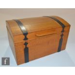 In the manner of Cotswold School - An oak and iron strapwork bound work or sewing box of casket