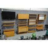 Robert Heritage for Beaver and Tapley - A teak modular shelving unit, each section measuring width