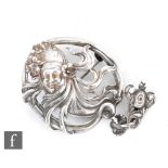 Gorham - An American Sterling silver Art Nouveau brooch formed as a maiden wearing flowers in her