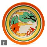 Clarice Cliff - Red Roofs - A circular plate circa 1931, hand painted with a stylised tree and
