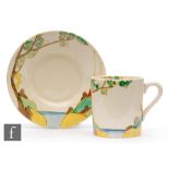 Clarice Cliff - Secrets - A tankard shape coffee can and saucer circa 1937, hand painted with a