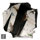 Unknown - A later 20th Century studio pottery square footed dish, the unglazed black clay body