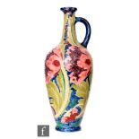 Charlotte Rhead - Bursley Ware - A large early 20th Century single handled ewer of slender form,