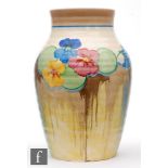 Clarice Cliff - Delecia Pansies - An Isis vase circa 1932, hand painted with a band of stylised