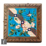 Unknown - A framed 8in waffle back dust pressed tile decorated in the Aesthetic style with a bird in