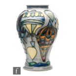 Jeanne McDougall - Moorcroft Pottery - A vase of inverted baluster form decorated in the Balloons