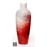 Ruskin Pottery - A high fired vase of skittle form decorated with a sang de beouf flambe glaze