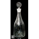Whitefriars - A glass decanter of bottle form in Flint, with conforming flat stopper with moulded