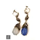 Bernard Instone - A pair of pendant drop earrings, each with stylised foliage above a cabochon cut