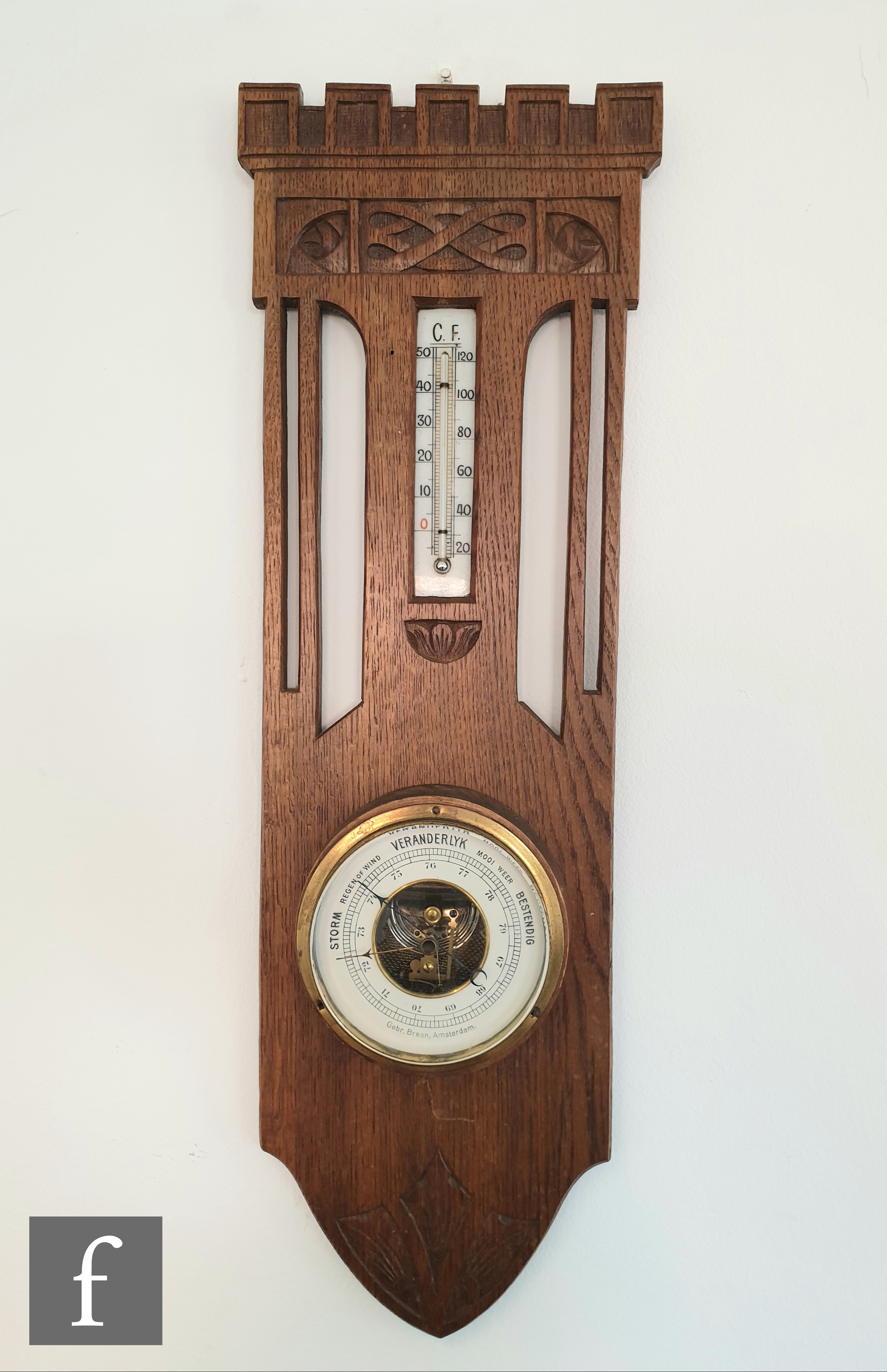 Unknown - An early 20th Century Dutch carved oak aneroid barometer