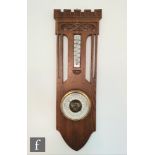 Unknown - An early 20th Century Dutch carved oak aneroid barometer