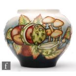 Debbie Hancock - Moorcroft Pottery - A Trial vase of compressed form decorated in the Mushrooms