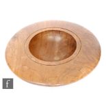 Jules Tattersall - A later 20th Century Jarrah Burl woodturned bowl of circular section with wide