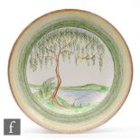 Clarice Cliff - Crayon Scene - Willow - A circular plate circa 1934, hand decorated with a willow