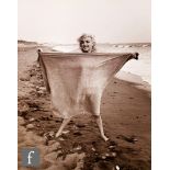 George Barris (B.1922) - 'Marilyn Monroe with Blanket, 1962', silver gelatin print, signed in ink,