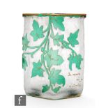 Daum - An early 20th Century cameo glass vase of rhomboid sleeve form, cased in green over clear and