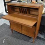 Robert Heritage - For Beaver & Tapley - A 1960s teak and glass bureau bookcase designed with upper