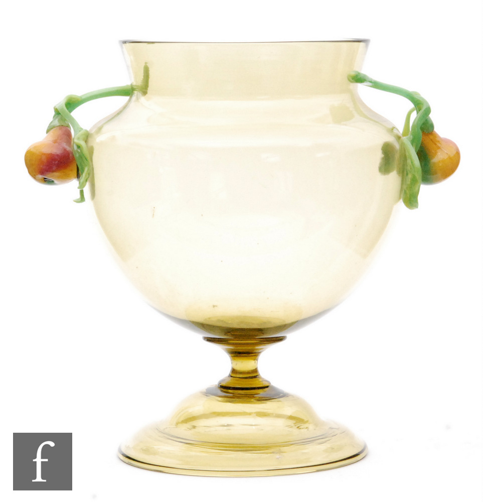 Salviati - An early 20th Century amber glass pedestal vase of ovoid form with everted rim above