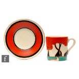 Clarice Cliff - Red Autumn - A Tankard shape coffee can and saucer circa 1930, hand painted with a