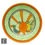 Clarice Cliff - Fruitburst Cafe au Lait - A circular plate circa 1930, hand painted with stylised