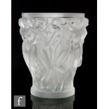 Lalique - A modern issue Bacchantes vase, of footed cylindrical form heavily relief moulded with a