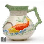 Clarice Cliff - Oceanic - An Oceanic jug circa 1936, relief moulded with fish, sea shells and
