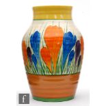 Clarice Cliff - Crocus - An Isis vase circa 1930, hand painted with large Crocus sprays between