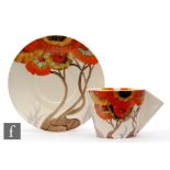 Clarice Cliff - Rhodanthe - A Conical shape coffee cup and saucer circa 1934, hand painted to cup