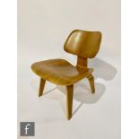 Charles and Ray Eames for Herman Miller - An LCW (Lounge Chair Wood) walnut finish plywood chair,