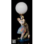 Goldscheider Keramik - A large 1930s Art Deco table lamp modelled as a lady in a flamboyant dress