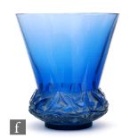 Rene Lalique - A Lierre, pattern 1041 dark blue glass vase circa 1930, of low shouldered form relief