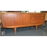 Jentique Furniture - A teak sideboard fitted with three drawers flanked by a double door cupboard