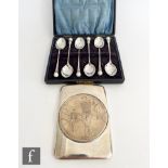 A cased set of six hallmarked tea spoons each with resin golf ball terminal with a rectangular