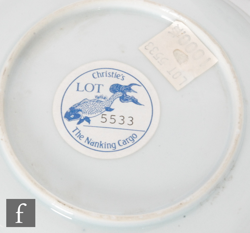 An 18th Century Nanking Cargo teabowl and saucer decorated in blue and white with stylised - Image 2 of 2