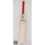 An N Power 2005 cricket bat for England vs Australia test squads signed in blue pen.